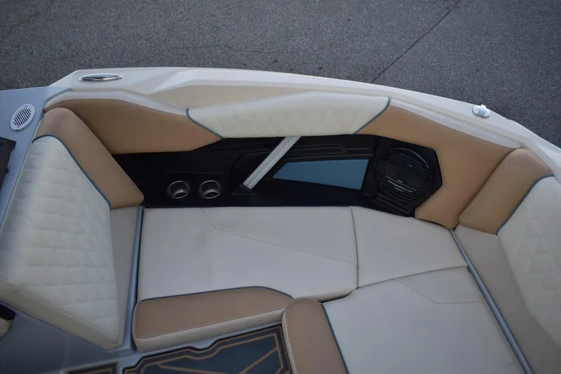 Slide: The Image of 2026 Tigé Z3 boat interior with beige and white cushioned seating. - 43
