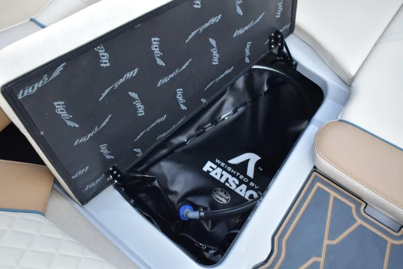 Slide: The Image of 2026 Tigé Z3 boat storage compartment with FATSAC ballast system. - 49