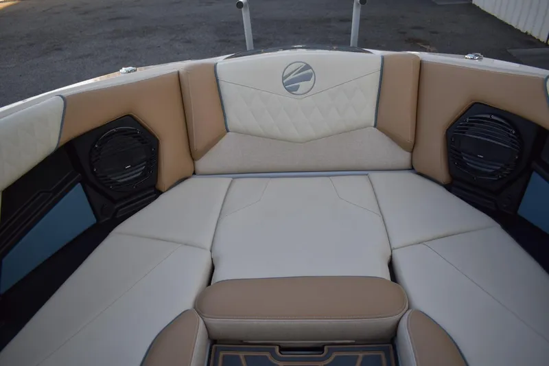 Slide: The Image of 2026 Tigé Z3 boat interior with beige and white cushioned seating. - 52