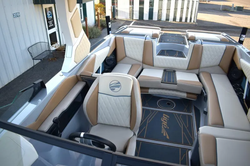 Slide: The Image of 2026 Tigé Z3 boat interior with luxurious seating and modern design. - 56