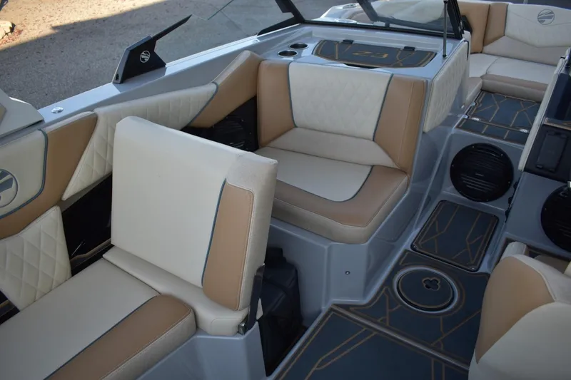 Slide: The Image of 2026 Tigé Z3 boat interior with beige and white seating, modern design. - 63