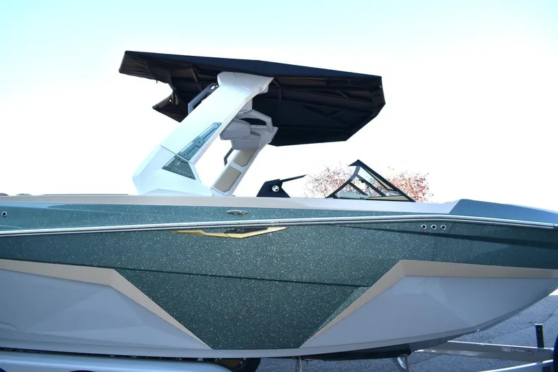 Slide: The Image of 2026 Tigé Z3 boat with sleek design and modern features, side view. - 7