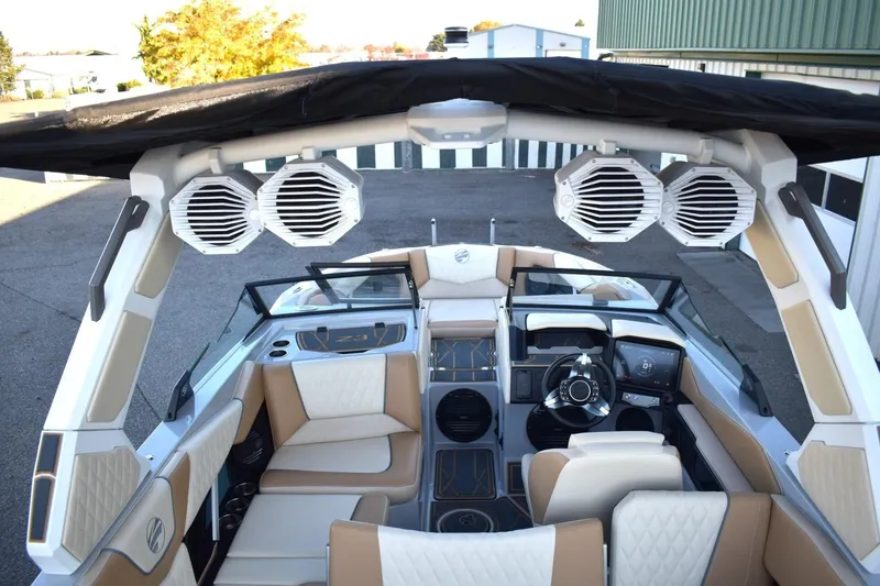 Slide: The Image of 2026 Tigé Z3 boat interior with premium seating and advanced audio system. - 73