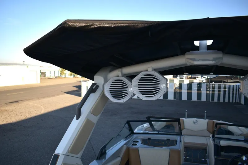 Slide: The Image of 2026 Tigé Z3 boat interior with speakers and canopy, showcasing modern design features. - 75