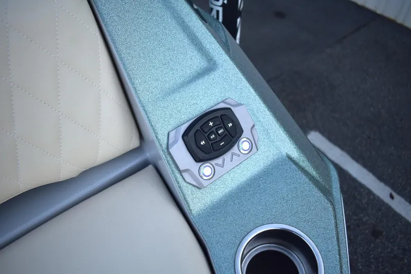 Slide: The Image of 2026 Tigé Z3 boat interior with control panel and cup holder. - 82