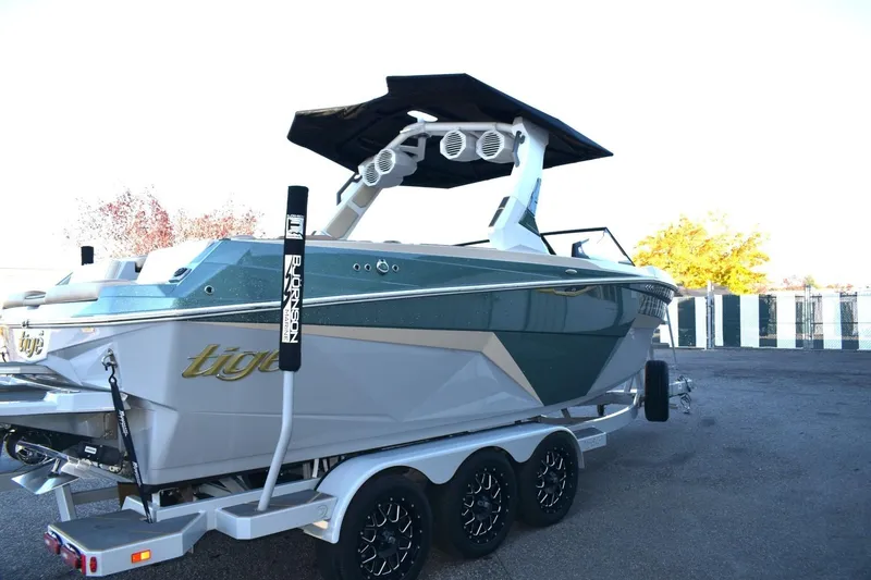 Slide: The Image of 2026 Tigé Z3 boat on trailer, featuring sleek design and modern audio system. - 9