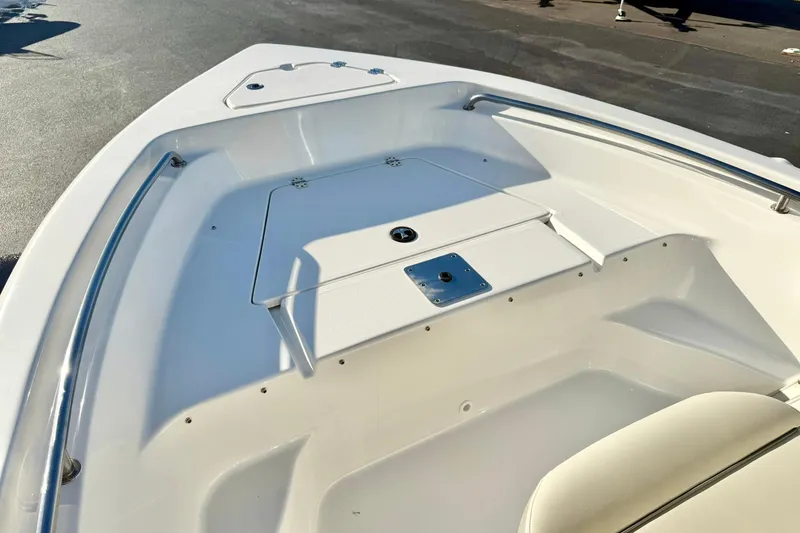 Slide: The Image of 2023 Key West 189 FS boat interior with seating and storage compartments. - 13