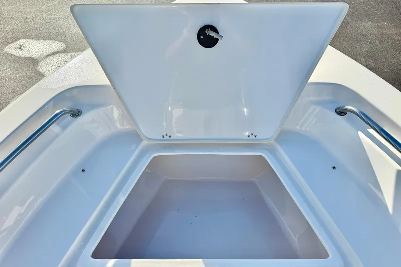 Slide: The Image of Open storage compartment on 2023 Key West 189 FS boat. - 16