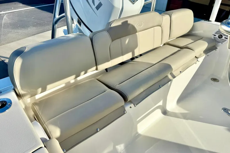 Slide: The Image of 2023 Key West 189 FS boat with beige cushioned seating. - 31