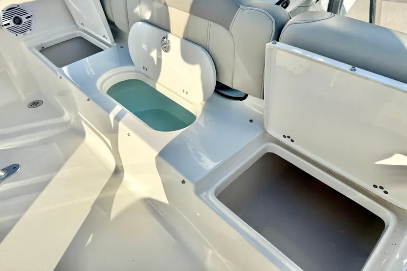 Slide: The Image of 2023 Key West 189 FS boat interior with storage compartments and seating. - 33