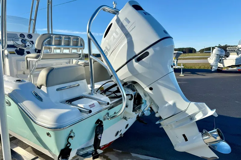 Slide: The Image of 2023 Key West 189 FS boat with Suzuki outboard motor, rear view. - 35