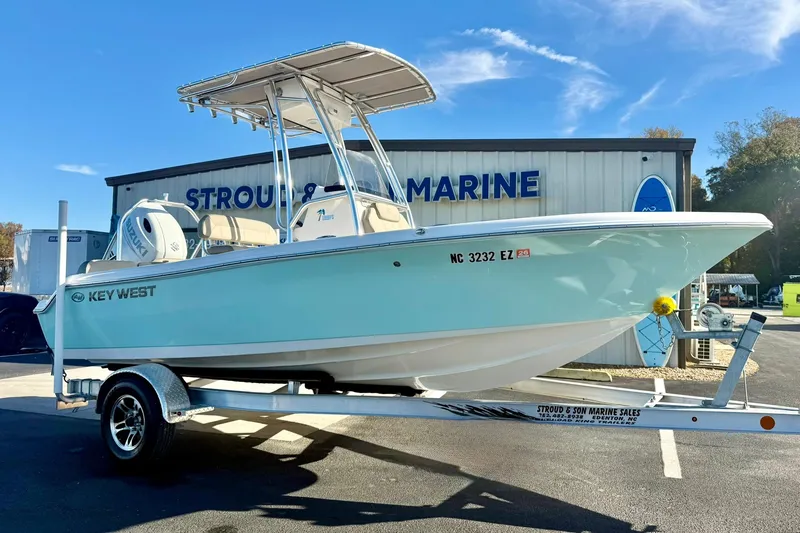 Slide: The Image of 2023 Key West 189 FS boat on trailer at Stroud Marine dealership. - 6