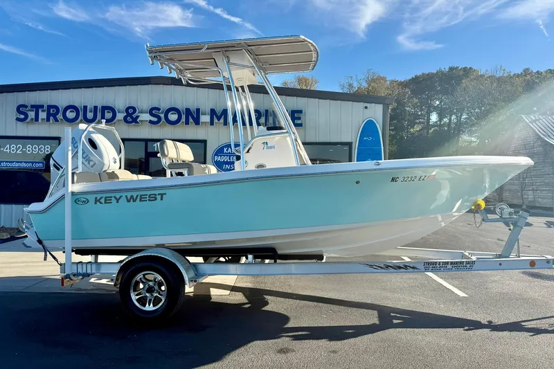 Slide: The Image of 2023 Key West 189 FS boat on trailer at Stroud & Son Marine dealership. - 7