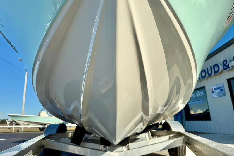 Slide: The Image of 2023 Key West 189 FS boat hull on trailer, close-up view. - 9