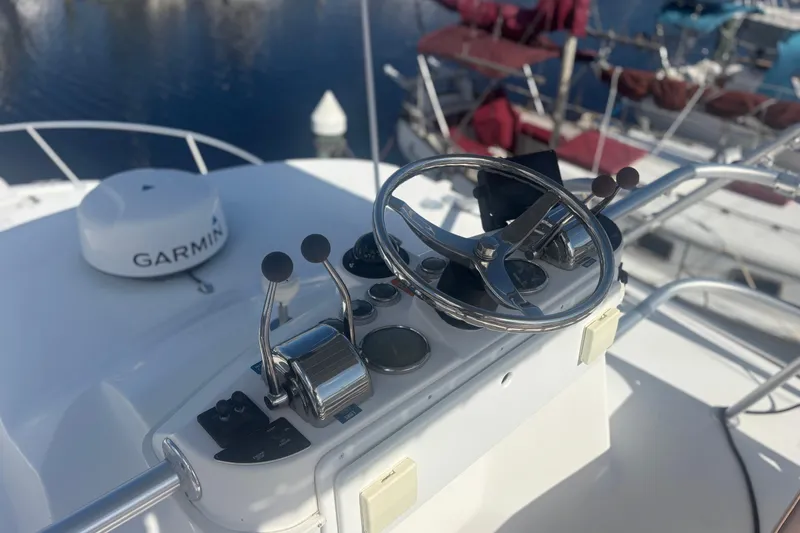 Slide: The Image of Helm of 2004 Luhrs 32 Open boat with Garmin navigation system. - 9