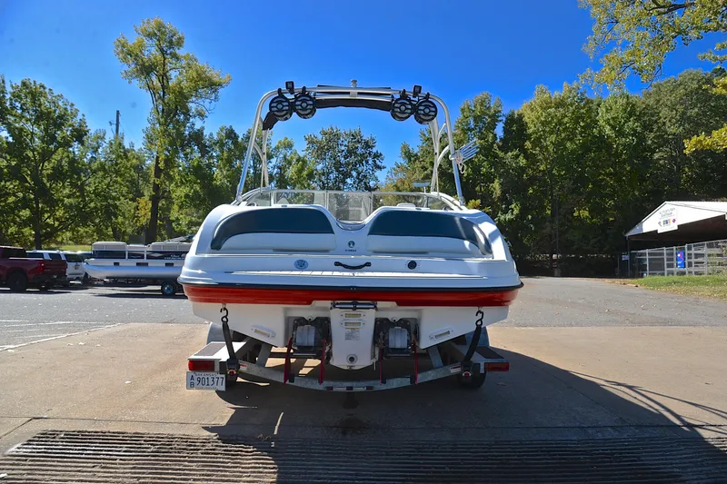 Slide: The Image of 2008 Yamaha Boats AR210 on trailer, surrounded by trees and clear blue sky. - 14