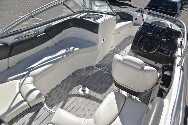 Slide: The Image of 2008 Yamaha Boats AR210 interior with sleek seating and modern dashboard. - 20