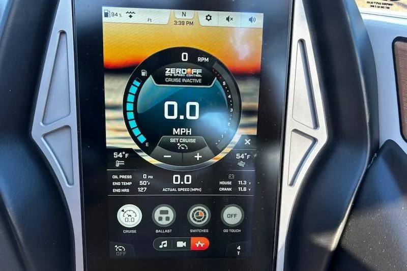 Slide: The Image of 2023 Tigé Z3 dashboard display showing cruise control and speed settings. - 13