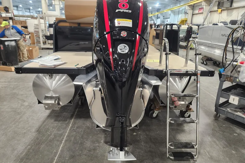 Slide: The Image of 2026 Avalon LSV VRL 2385 TripleToon with Patio Pad in a manufacturing facility. - 11