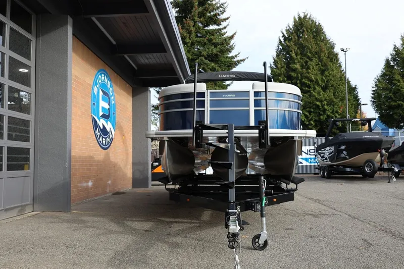 Slide: The Image of 2026 Harris CRUISER 230 SL pontoon boat at Bjornson Marine dealership. - 12