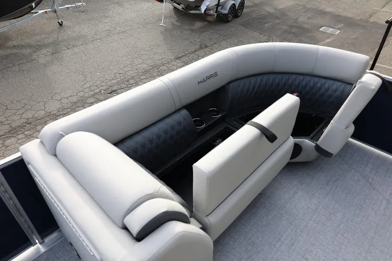 Slide: The Image of Luxurious seating on 2026 Harris CRUISER 230 SL pontoon boat with cup holders and storage. - 39