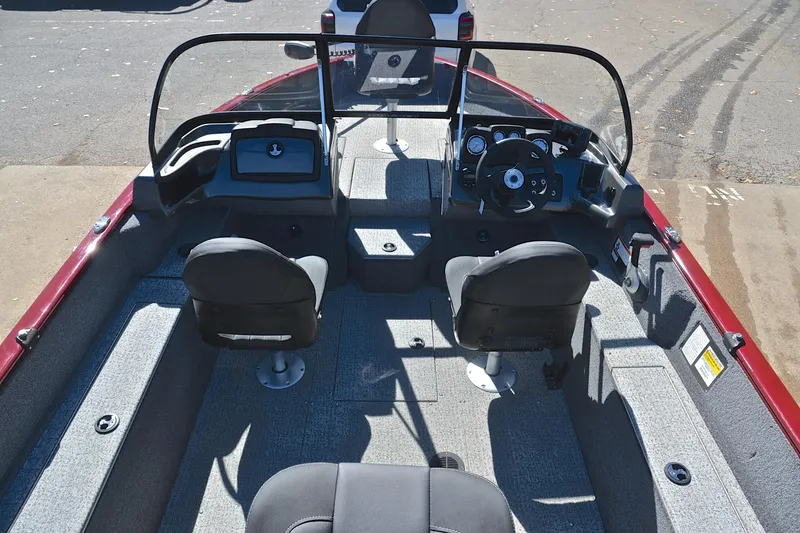 Slide: The Image of 2022 Bass Tracker Pro Guide V175 WT boat interior with dual seats and steering console. - 18