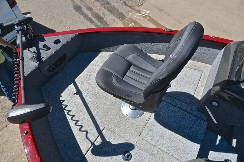 Slide: The Image of 2022 Bass Tracker Pro Guide V175 WT boat interior with swivel seat and trolling motor. - 22