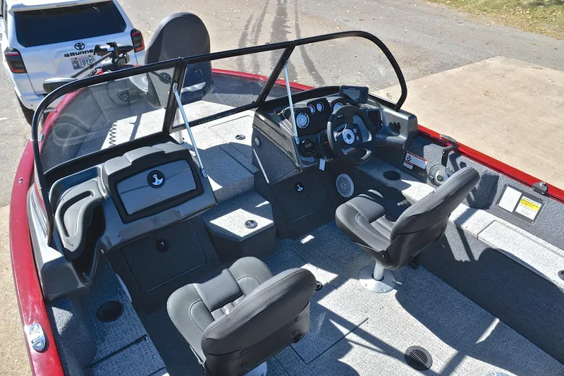 Slide: The Image of 2022 Bass Tracker Pro Guide V175 WT boat interior with dual seats and steering console. - 23