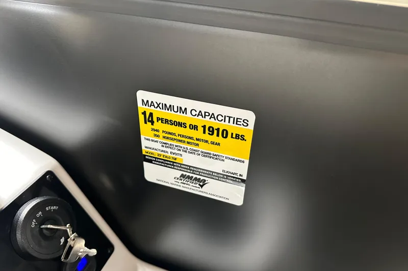 Slide: The Image of Maximum capacity label on 2026 Evotti 723 CS boat, 14 persons or 1910 lbs. - 16