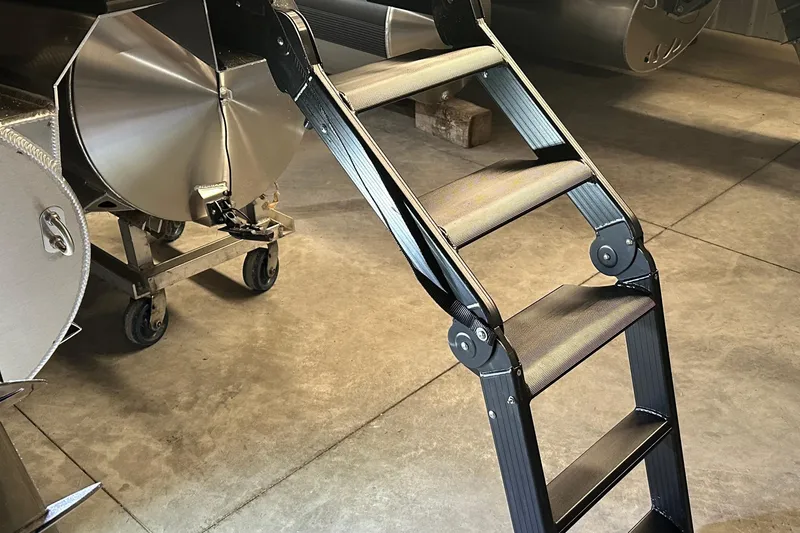 Slide: The Image of Folding metal ladder beside industrial equipment, Evotti 723 CS, 2026 model. - 23