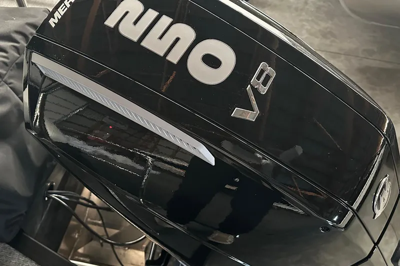 Slide: The Image of Black Evotti 723 CS V8 engine, 2026 model, with reflective surface and visible branding. - 30