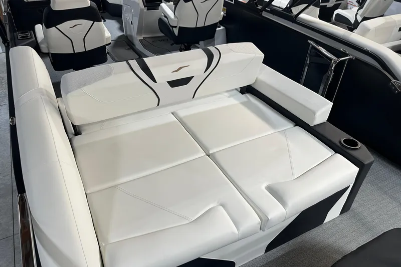 Slide: The Image of Luxurious seating in the 2026 Evotti 723 CS boat, featuring sleek white upholstery. - 4