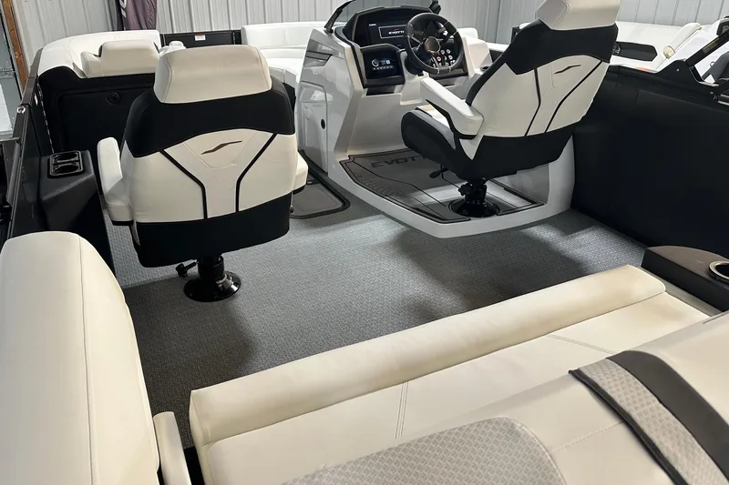 Slide: The Image of Interior of 2026 Evotti 723 CS boat with modern seating and steering console. - 6