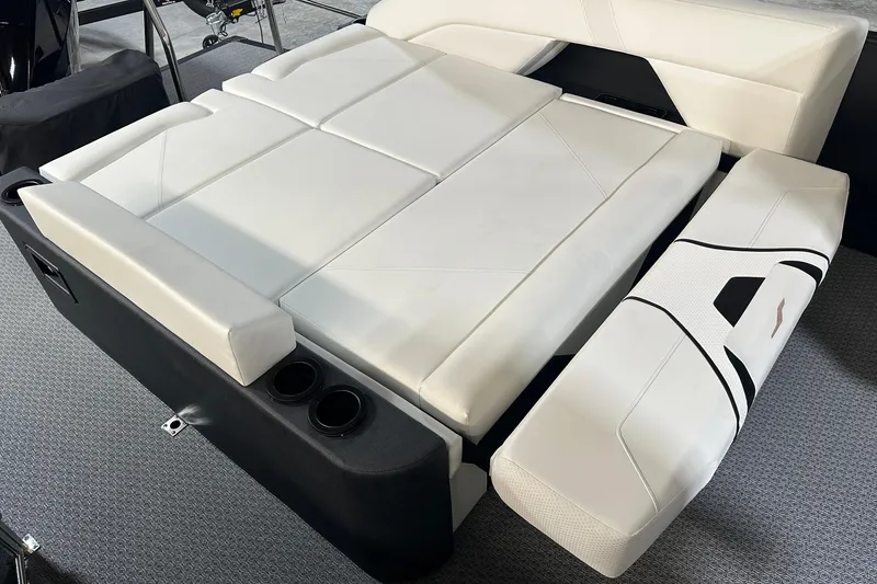 Slide: The Image of Luxurious white seating on 2026 Evotti 723 CS boat, featuring cup holders and modern design. - 9