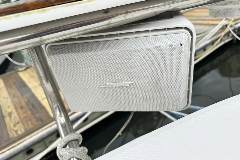 Slide: The Image of Outdoor Bose speaker mounted on a 2000 Hunter 290 sailboat railing. - 34