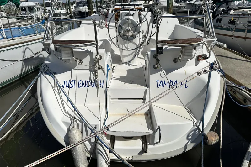 Slide: The Image of Hunter 290 sailboat from 2000 docked, named "Just Enough," located in Tampa, FL. - 4