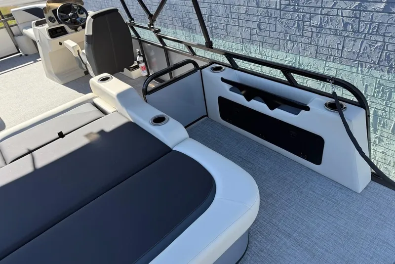 Slide: The Image of 2026 Avalon Venture 85 VRB 2385 boat interior with seating and steering console. - 13