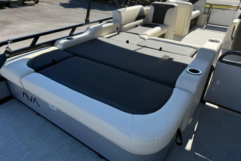 Slide: The Image of 2026 Avalon Venture 85 VRB 2385 boat interior with luxurious seating and cup holders. - 14