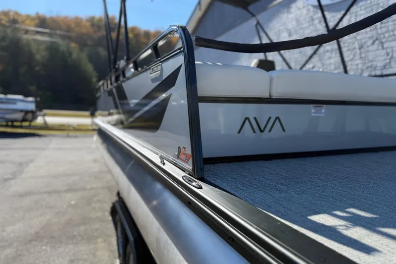 Slide: The Image of 2026 Avalon Venture 85 VRB 2385 pontoon boat, sleek design, outdoor setting. - 6