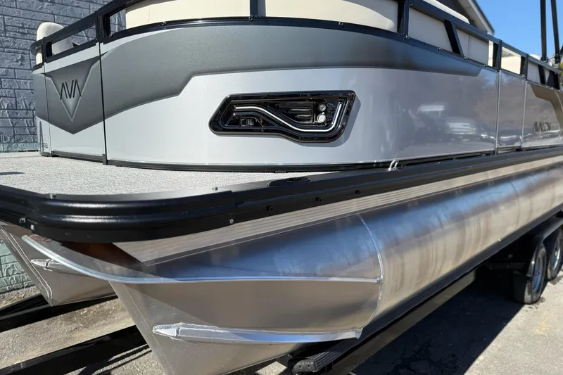 Slide: The Image of 2026 Avalon Venture 85 VRB 2385 pontoon boat, sleek design, silver finish. - 7