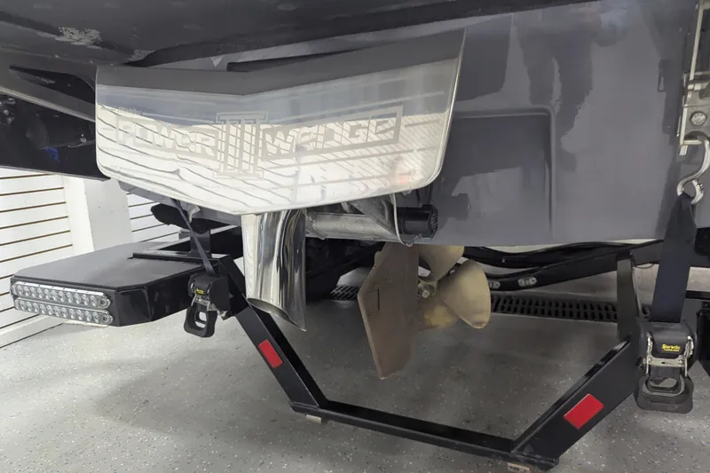 Slide: The Image of 2022 Malibu Wakesetter 22 LSV boat propeller and wake system detail. - 22