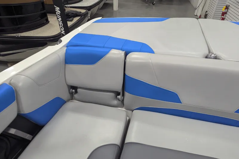 Slide: The Image of 2022 Malibu Wakesetter 22 LSV interior with blue and gray seating. - 23