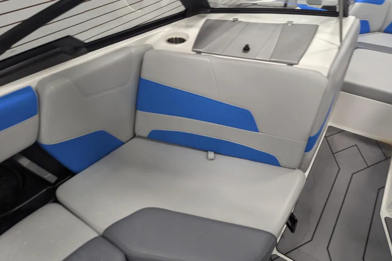Slide: The Image of 2022 Malibu Wakesetter 22 LSV interior with blue and gray seating. - 26