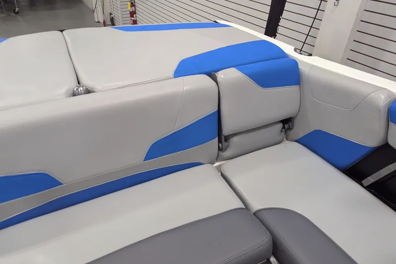 Slide: The Image of 2022 Malibu Wakesetter 22 LSV interior with blue and gray seating. - 32