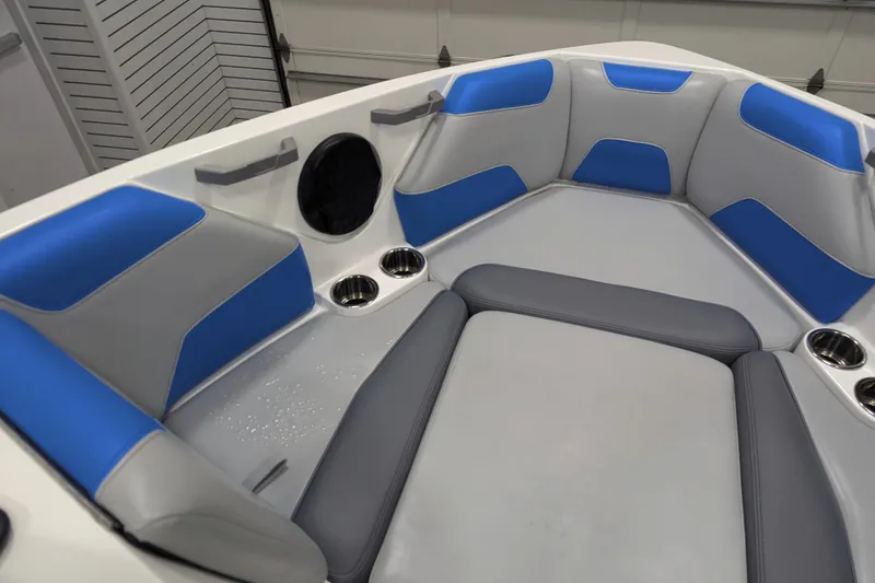 Slide: The Image of Interior of 2022 Malibu Wakesetter 22 LSV boat with blue and gray seating. - 35
