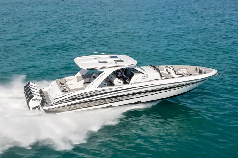 The Image of 2026 Deep Impact 449 Sport boat speeding on open ocean waters. - 0