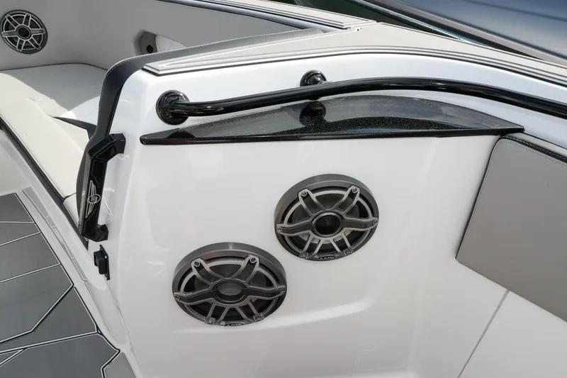 Slide: The Image of 2026 Deep Impact 449 Sport boat cruising on open water under a clear sky. - 11