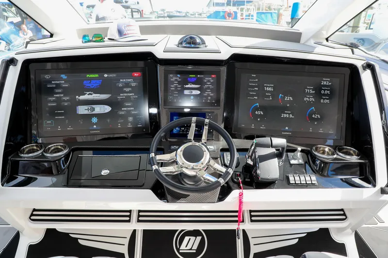 Slide: The Image of 2026 Deep Impact 449 Sport boat with powerful Racing 500 engines on open water. - 12