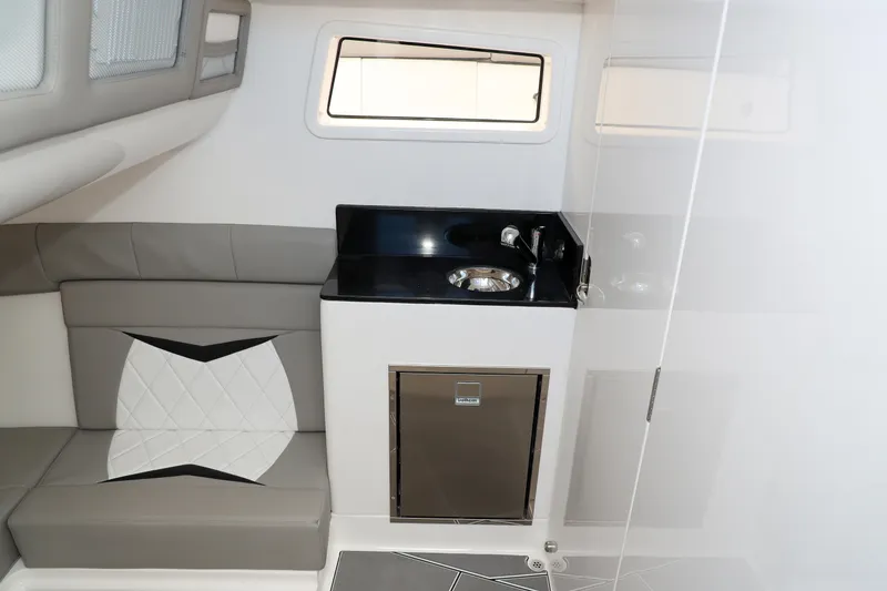 Slide: The Image of Interior of 2026 Deep Impact 449 Sport boat, featuring modern seating and sleek design. - 15