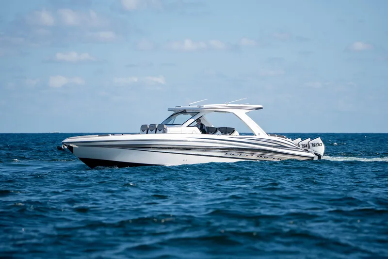 Slide: The Image of Garmin touchscreen display on 2026 Deep Impact 449 Sport boat, showing navigation and control options. - 29